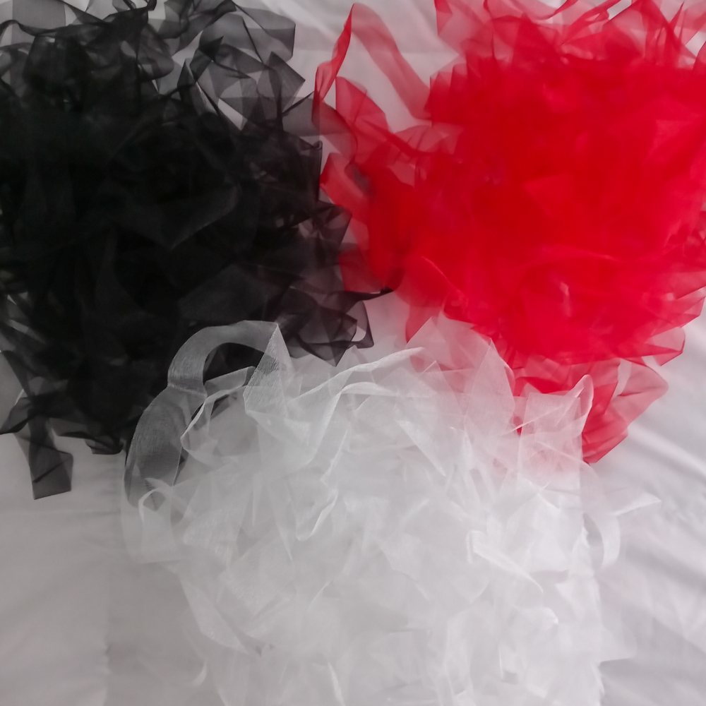 Red, Black, and White Tulle Fabric